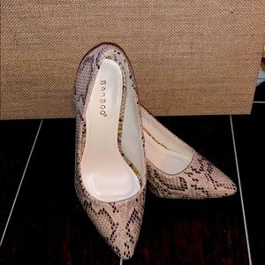 Tan colored snake skin high heels